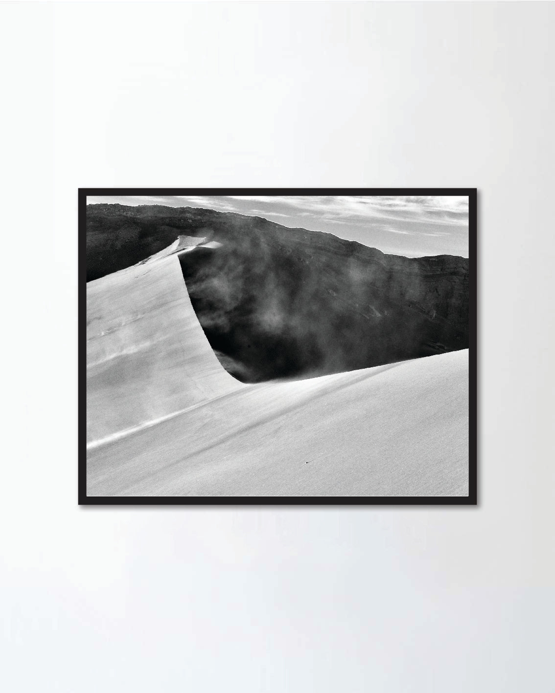 Black and white image of a sand dune