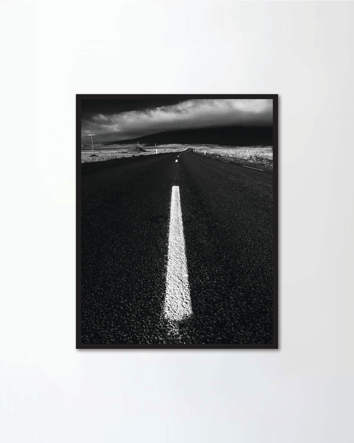 Low angle view of empty road winding
