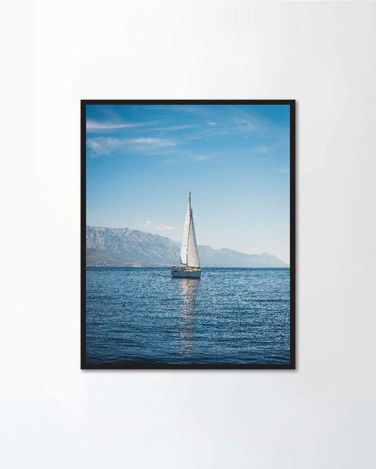 Sailing boat in the sea against the backdrop