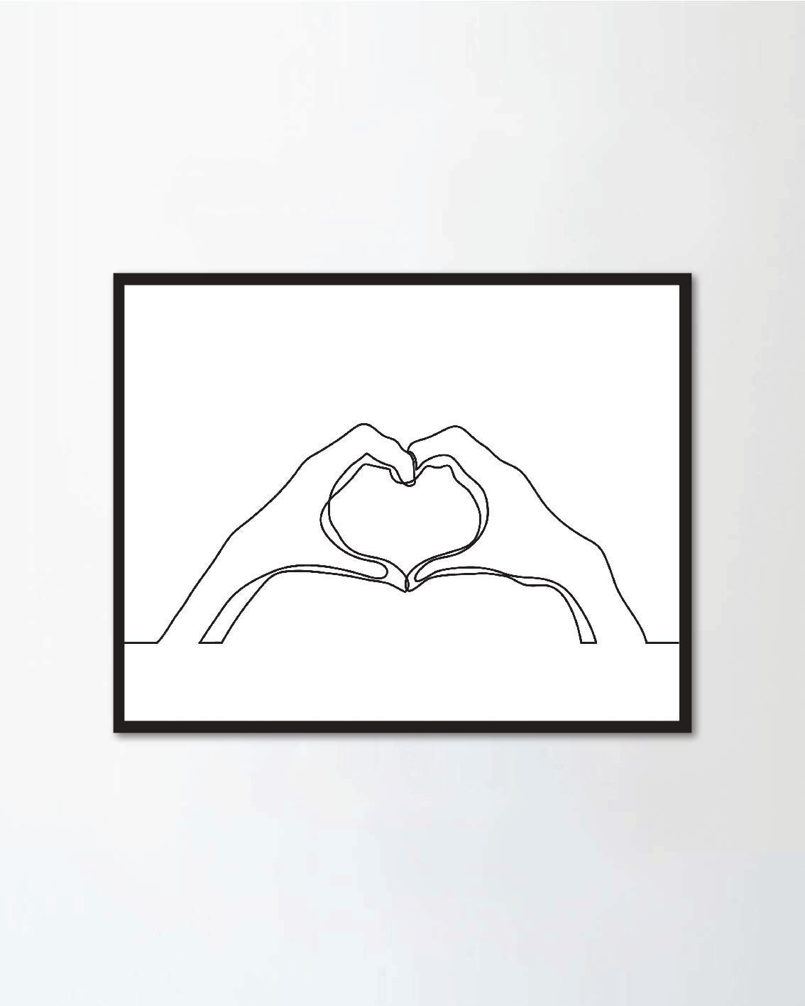 Hands showing love sign