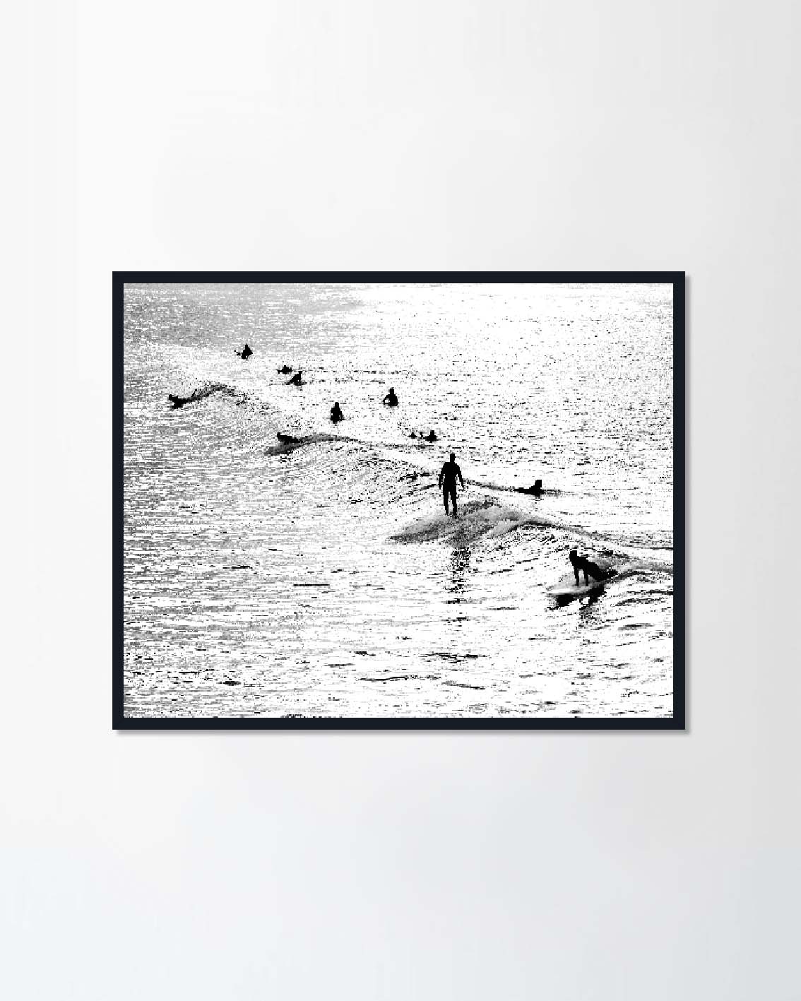 Silhouette of several surfers