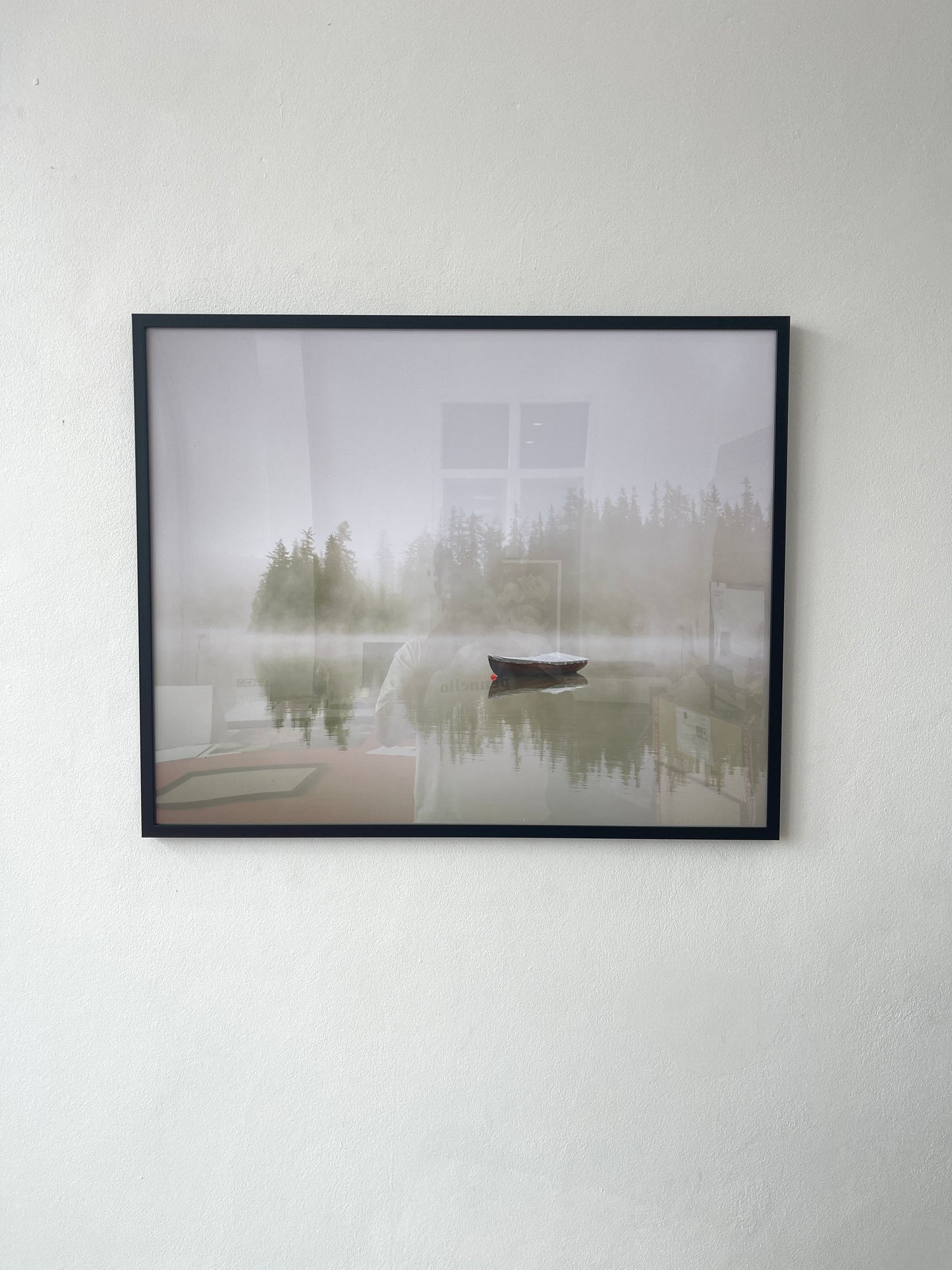 Boat on the lake at morning fog.