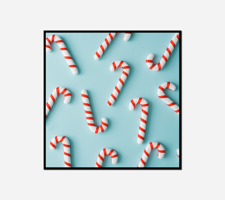 many candy canes blue surface black
