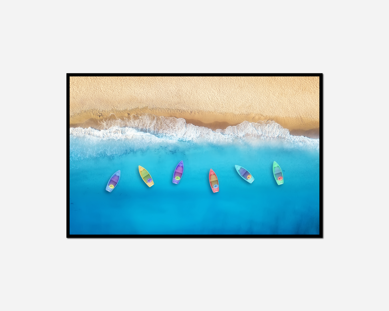 five surfboards lined beach water