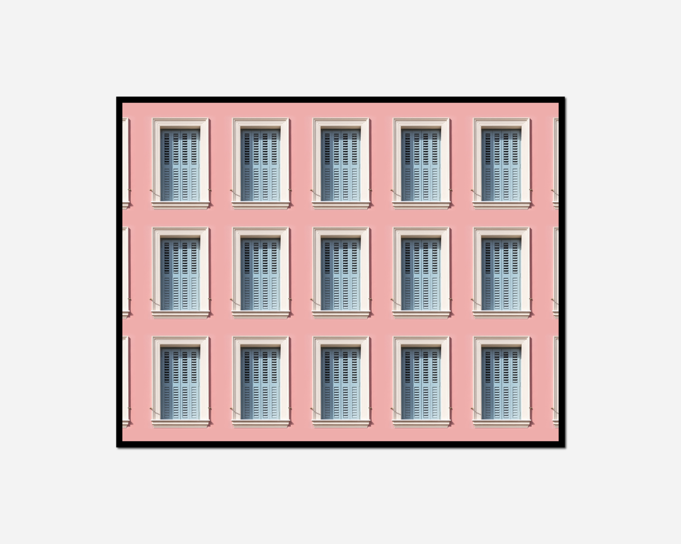 pink building many windows clock