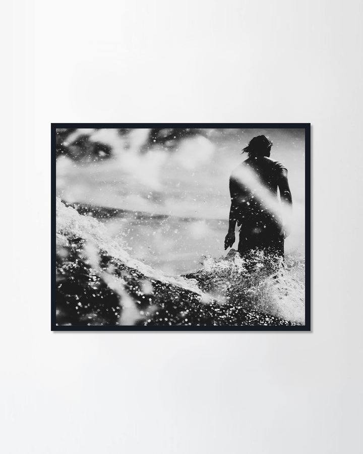 Catches a wave  on the island of Bali