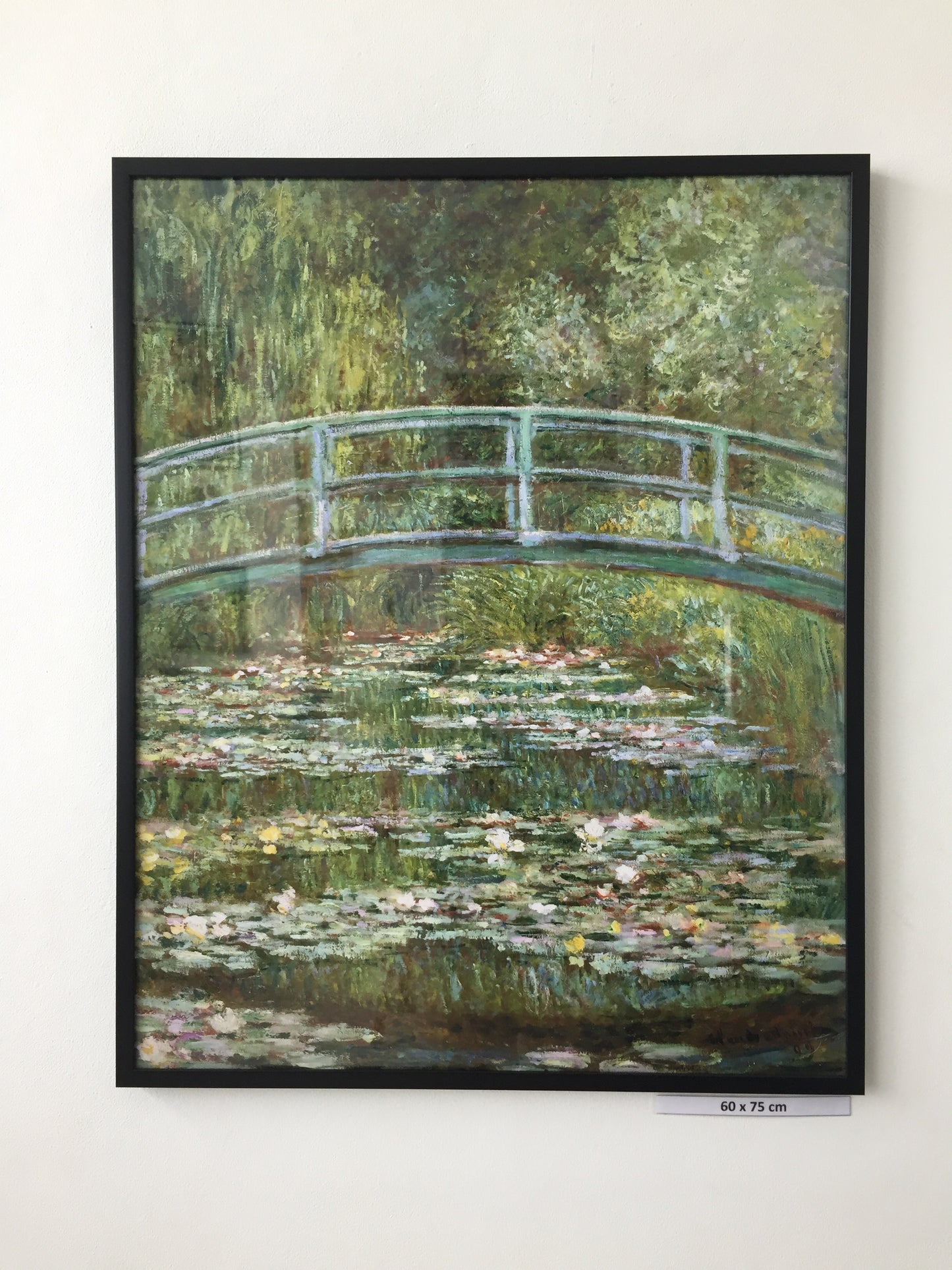 Bridge over a Pond of Water Lilies, by Claude Monet, 1899