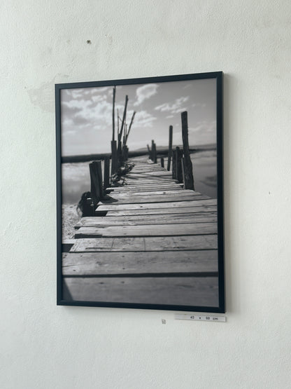 Black white pier poles water