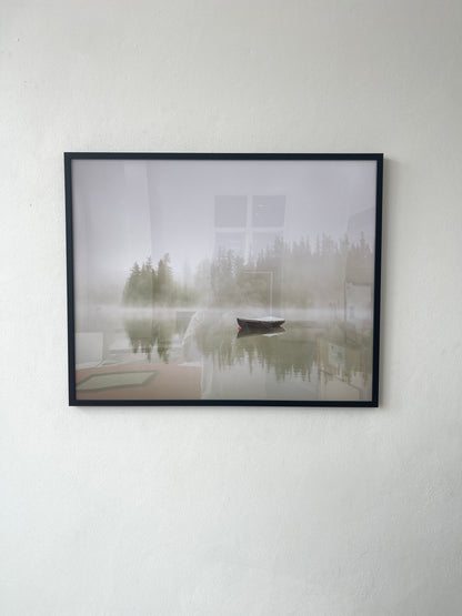 Boat on the lake at morning fog.