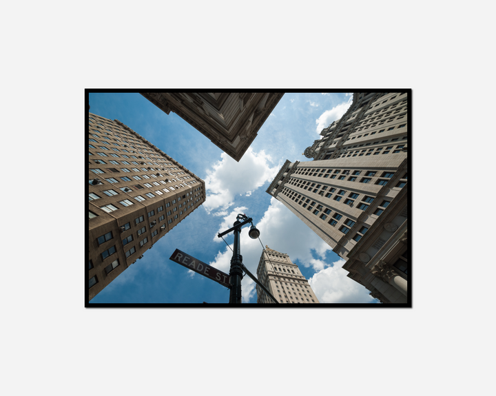 many tall buildings city street sign