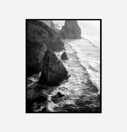 Black white rocky beach waves crashing