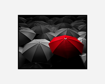 Red umbrella standing out from group black umbrellas